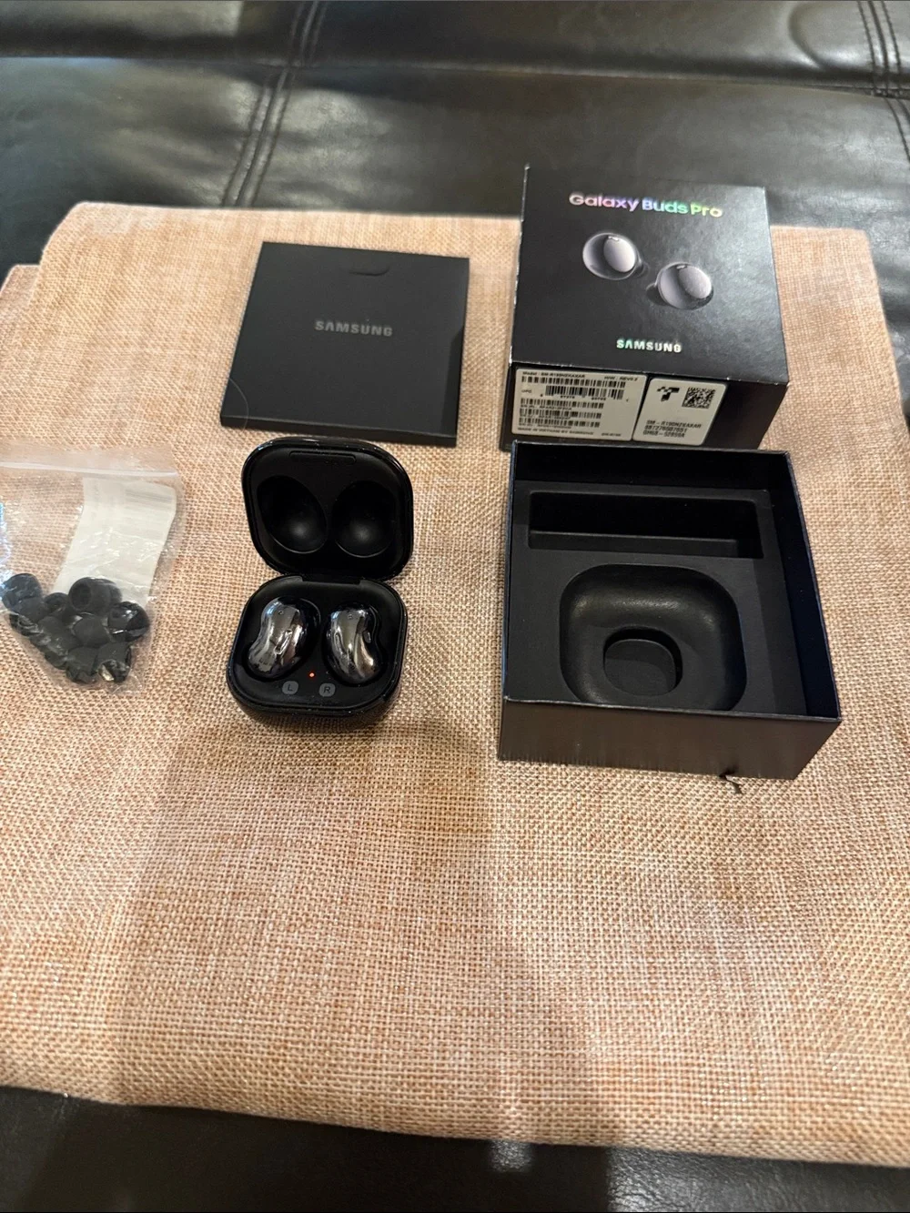 Samsung Galaxy Buds Pro in reflective silver and black